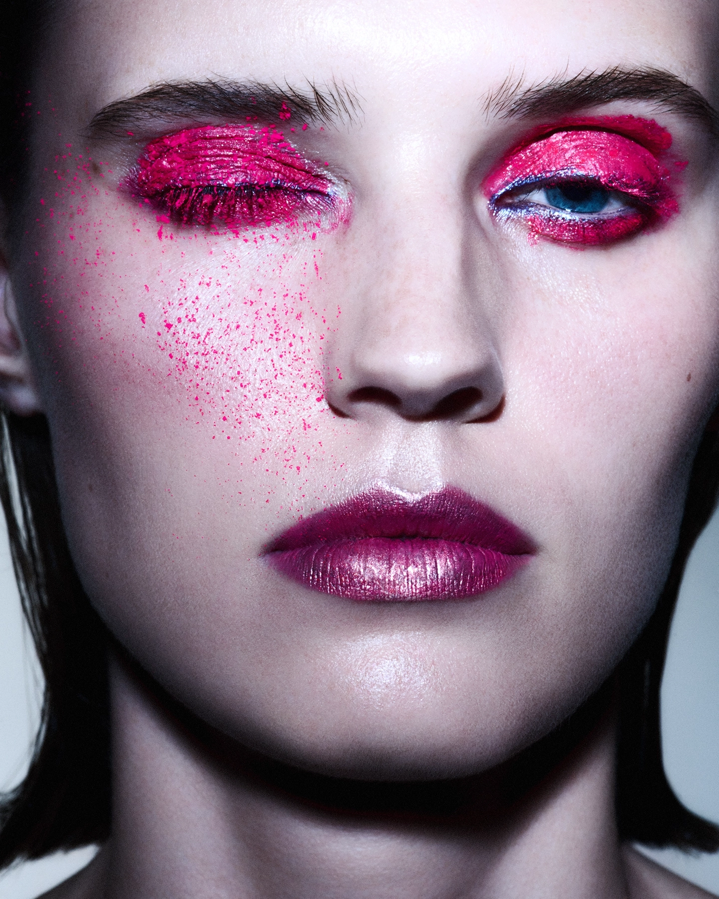 Close-up with hot pink metallic eyeshadow scattered across cheek and magenta lip for Sicky Magazine, makeup by Jeanette Gjerde Olsen